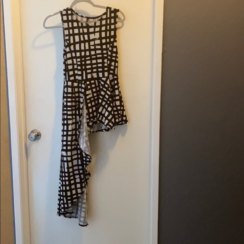 Black and white patterned peplum top
